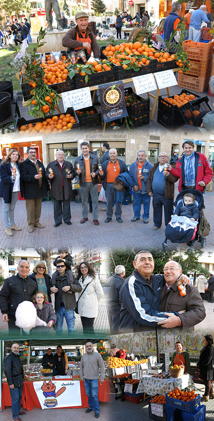 Reparto de bolsas con mandarinas en el Mercat de la Taronja Reparto de bolsas con mandarinas en el Mercat de la Taronja