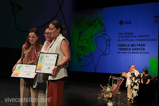 El XXV Premio Ciutat de Castelló de Literatura Infantil Ilustrada Tombatossals es para Rebeca Beltrán (escritora) y Rebeca Gracia (Ilustradora) por su obra “El corazón de Nour” El XXV Premio Ciutat de Castelló de Literatura Infantil Ilustrada Tombatossals es para Rebeca Beltrán (escritora) y Rebeca Gracia (Ilustradora) por su obra “El corazón de Nour”
