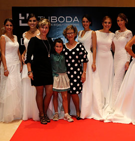 Trajes de novia y fiesta de Modas Rossy en Feria tu Boda