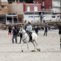 Carrera de caballos y burros