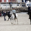 Carrera de caballos y burros