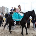 Carrera de caballos y burros