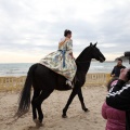 Carrera de caballos y burros