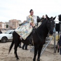 Carrera de caballos y burros