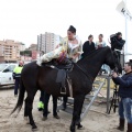 Carrera de caballos y burros