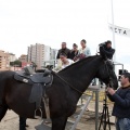 Carrera de caballos y burros