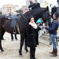 Carrera de caballos y burros