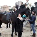 Carrera de caballos y burros