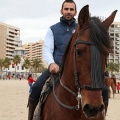 Carrera de caballos y burros