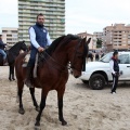 Carrera de caballos y burros