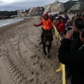 Carrera de caballos y burros