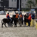 Carrera de caballos y burros