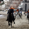 Carrera de caballos y burros