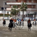 Carrera de caballos y burros