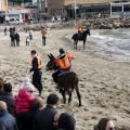 Carrera de caballos y burros