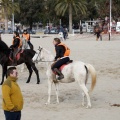 Carrera de caballos y burros