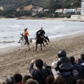 Carrera de caballos y burros