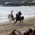 Carrera de caballos y burros