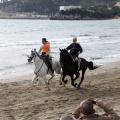 Carrera de caballos y burros