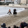 Carrera de caballos y burros