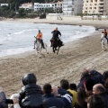 Carrera de caballos y burros