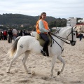 Carrera de caballos y burros